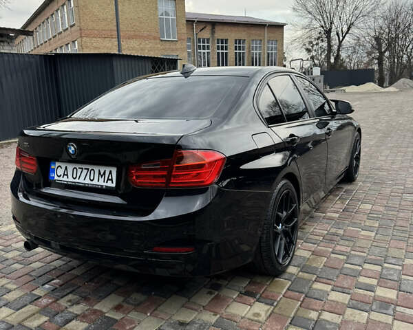 Черный БМВ 3 Серия, объемом двигателя 2 л и пробегом 230 тыс. км за 14700 $, фото 5 на Automoto.ua