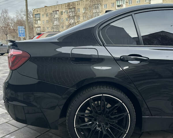 Чорний БМВ 3 Серія, об'ємом двигуна 2 л та пробігом 173 тис. км за 13450 $, фото 12 на Automoto.ua