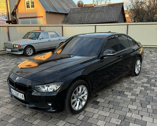 Черный БМВ 3 Серия, объемом двигателя 2 л и пробегом 199 тыс. км за 12800 $, фото 1 на Automoto.ua