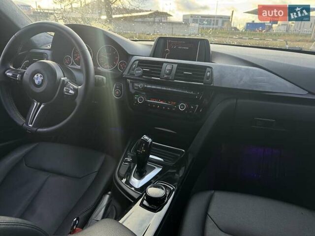 Чорний БМВ 3 Серія, об'ємом двигуна 2 л та пробігом 240 тис. км за 13800 $, фото 22 на Automoto.ua