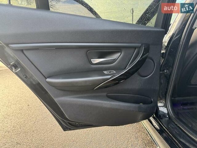 Чорний БМВ 3 Серія, об'ємом двигуна 2 л та пробігом 240 тис. км за 13800 $, фото 14 на Automoto.ua