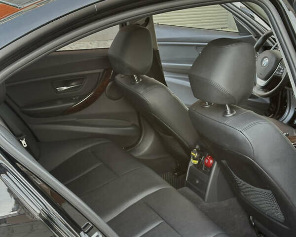 Черный БМВ 3 Серия, объемом двигателя 2 л и пробегом 154 тыс. км за 15999 $, фото 12 на Automoto.ua