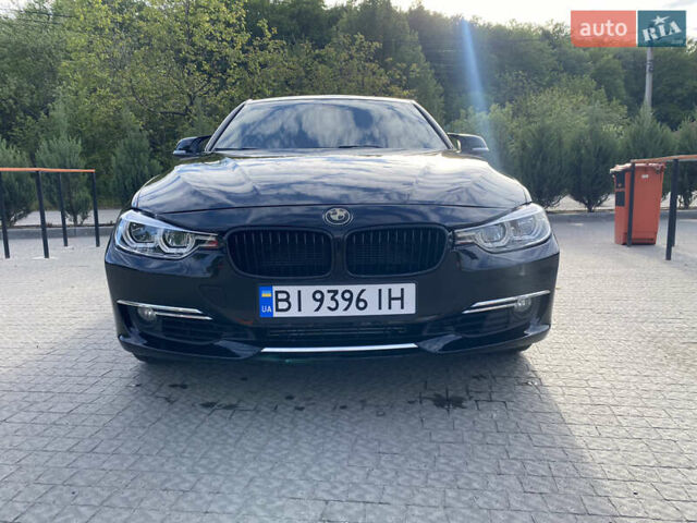Чорний БМВ 3 Серія, об'ємом двигуна 2 л та пробігом 141 тис. км за 11799 $, фото 1 на Automoto.ua