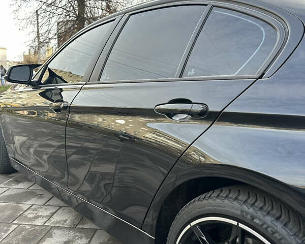 Чорний БМВ 3 Серія, об'ємом двигуна 2 л та пробігом 173 тис. км за 13450 $, фото 13 на Automoto.ua