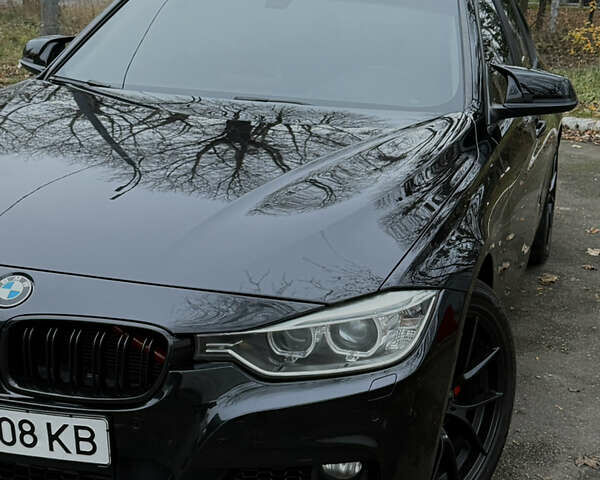 Черный БМВ 3 Серия, объемом двигателя 2 л и пробегом 207 тыс. км за 15900 $, фото 8 на Automoto.ua