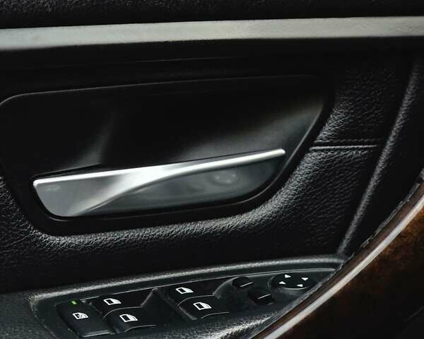 Черный БМВ 3 Серия, объемом двигателя 2 л и пробегом 173 тыс. км за 12700 $, фото 21 на Automoto.ua