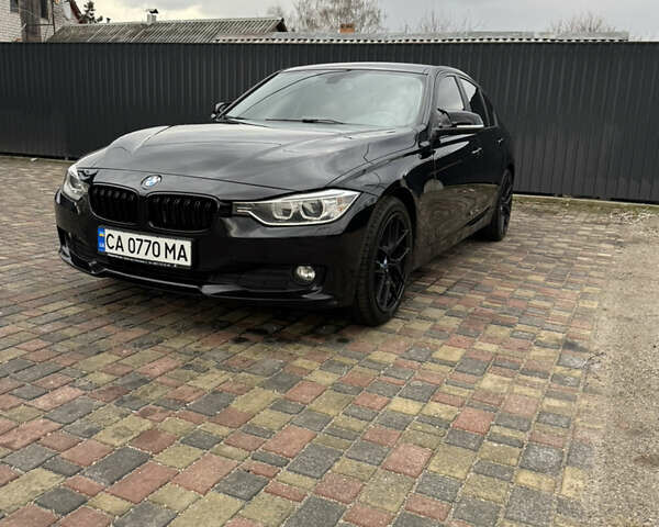 Черный БМВ 3 Серия, объемом двигателя 2 л и пробегом 230 тыс. км за 14700 $, фото 1 на Automoto.ua