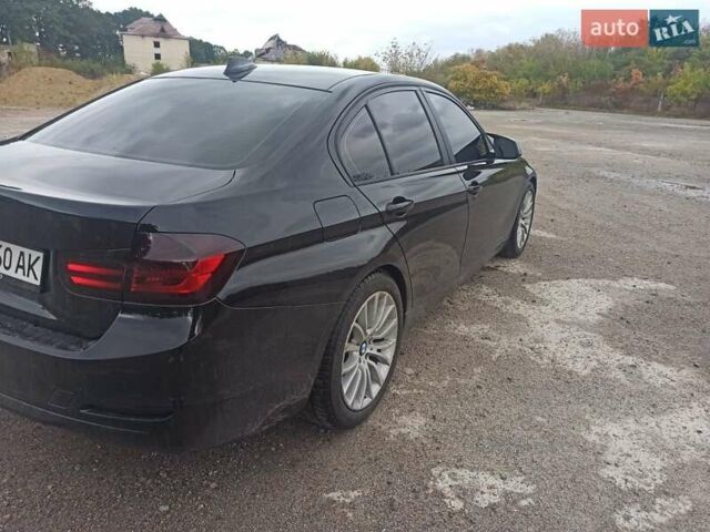 Черный БМВ 3 Серия, объемом двигателя 2 л и пробегом 200 тыс. км за 11000 $, фото 16 на Automoto.ua