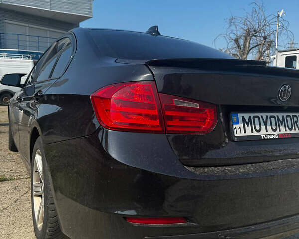 Чорний БМВ 3 Серія, об'ємом двигуна 2 л та пробігом 197 тис. км за 11800 $, фото 1 на Automoto.ua