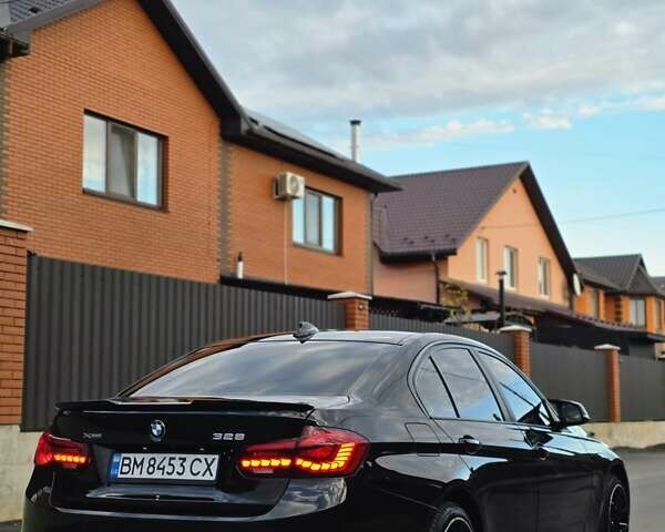 Черный БМВ 3 Серия, объемом двигателя 2 л и пробегом 173 тыс. км за 12700 $, фото 1 на Automoto.ua
