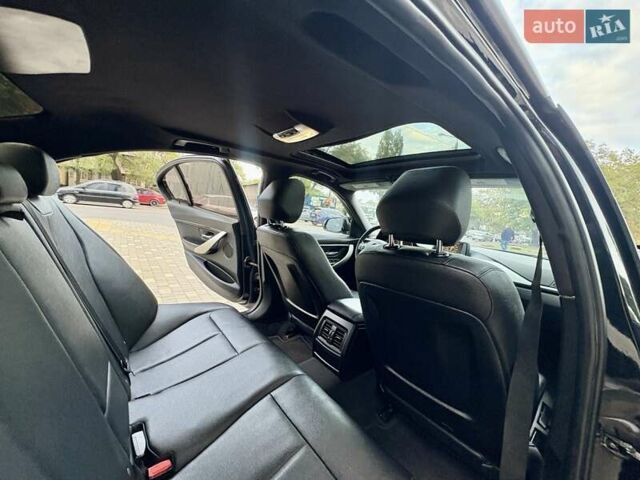 Черный БМВ 3 Серия, объемом двигателя 2 л и пробегом 177 тыс. км за 9400 $, фото 7 на Automoto.ua