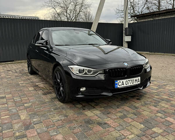 Черный БМВ 3 Серия, объемом двигателя 2 л и пробегом 230 тыс. км за 14700 $, фото 2 на Automoto.ua