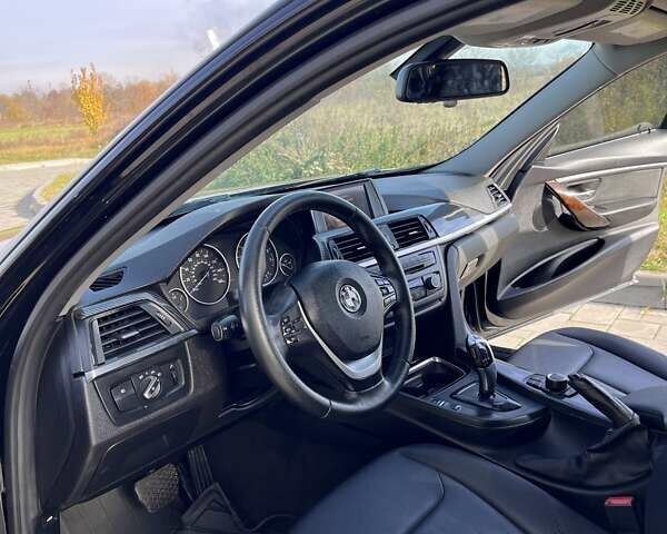 Черный БМВ 3 Серия, объемом двигателя 2 л и пробегом 185 тыс. км за 12700 $, фото 14 на Automoto.ua