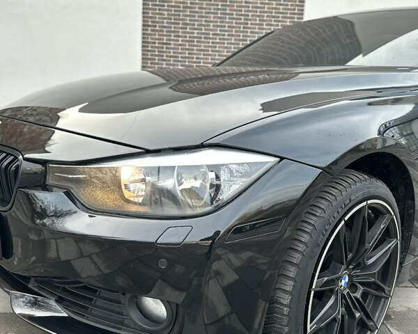 Чорний БМВ 3 Серія, об'ємом двигуна 2 л та пробігом 173 тис. км за 13450 $, фото 2 на Automoto.ua