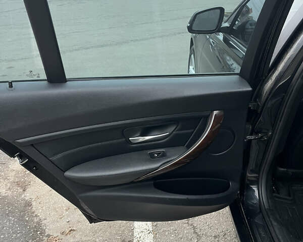 Чорний БМВ 3 Серія, об'ємом двигуна 2 л та пробігом 182 тис. км за 15300 $, фото 9 на Automoto.ua