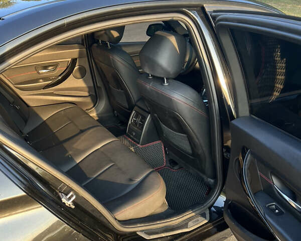 Черный БМВ 3 Серия, объемом двигателя 2 л и пробегом 186 тыс. км за 14700 $, фото 5 на Automoto.ua