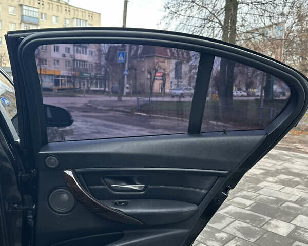 Чорний БМВ 3 Серія, об'ємом двигуна 2 л та пробігом 173 тис. км за 13450 $, фото 42 на Automoto.ua