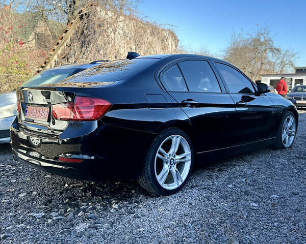 Чорний БМВ 3 Серія, об'ємом двигуна 2 л та пробігом 237 тис. км за 13900 $, фото 4 на Automoto.ua