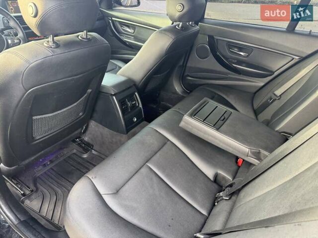Чорний БМВ 3 Серія, об'ємом двигуна 2 л та пробігом 240 тис. км за 13800 $, фото 13 на Automoto.ua