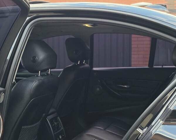 Черный БМВ 3 Серия, объемом двигателя 2 л и пробегом 173 тыс. км за 12700 $, фото 18 на Automoto.ua