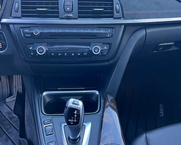 Чорний БМВ 3 Серія, об'ємом двигуна 2 л та пробігом 237 тис. км за 13900 $, фото 11 на Automoto.ua