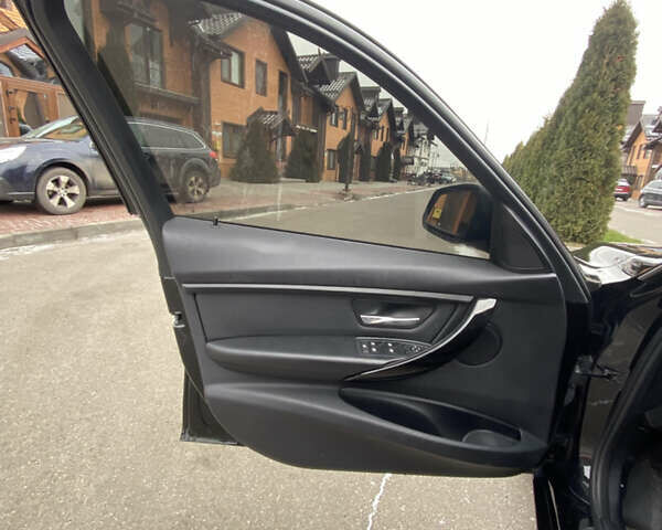 Черный БМВ 3 Серия, объемом двигателя 2 л и пробегом 199 тыс. км за 11400 $, фото 12 на Automoto.ua