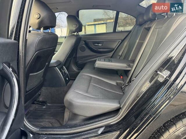 Чорний БМВ 3 Серія, об'ємом двигуна 2 л та пробігом 240 тис. км за 13800 $, фото 11 на Automoto.ua
