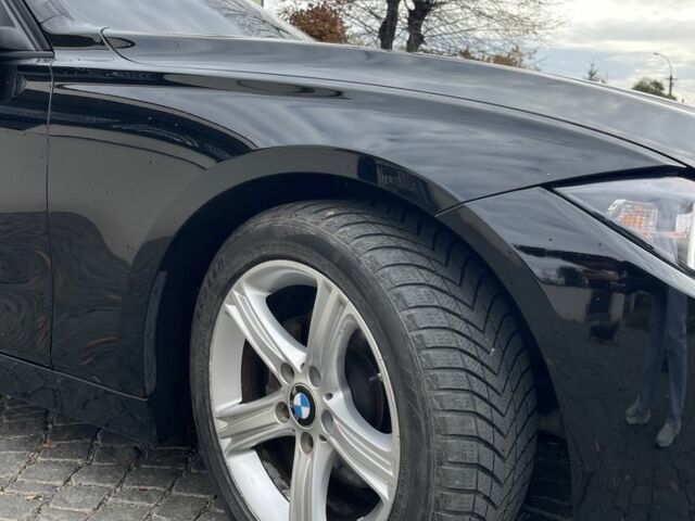 Черный БМВ 3 Серия, объемом двигателя 2 л и пробегом 200 тыс. км за 11700 $, фото 1 на Automoto.ua