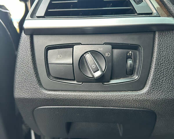 Чорний БМВ 3 Серія, об'ємом двигуна 2 л та пробігом 173 тис. км за 13450 $, фото 25 на Automoto.ua