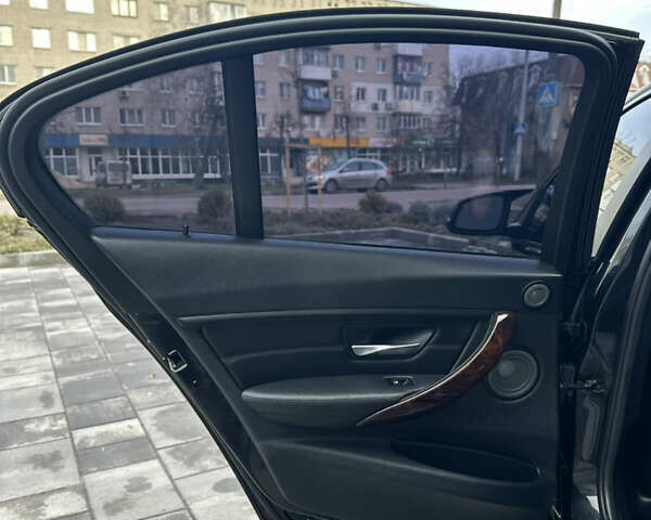 Чорний БМВ 3 Серія, об'ємом двигуна 2 л та пробігом 173 тис. км за 13450 $, фото 33 на Automoto.ua