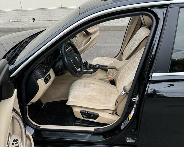 Чорний БМВ 3 Серія, об'ємом двигуна 2 л та пробігом 128 тис. км за 14800 $, фото 7 на Automoto.ua