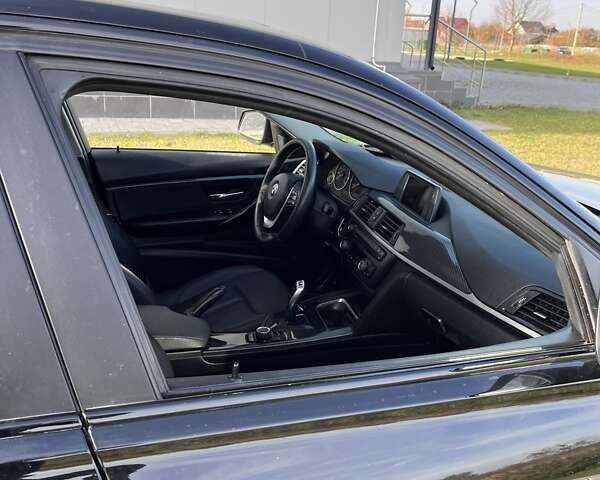 Черный БМВ 3 Серия, объемом двигателя 2 л и пробегом 185 тыс. км за 12700 $, фото 16 на Automoto.ua