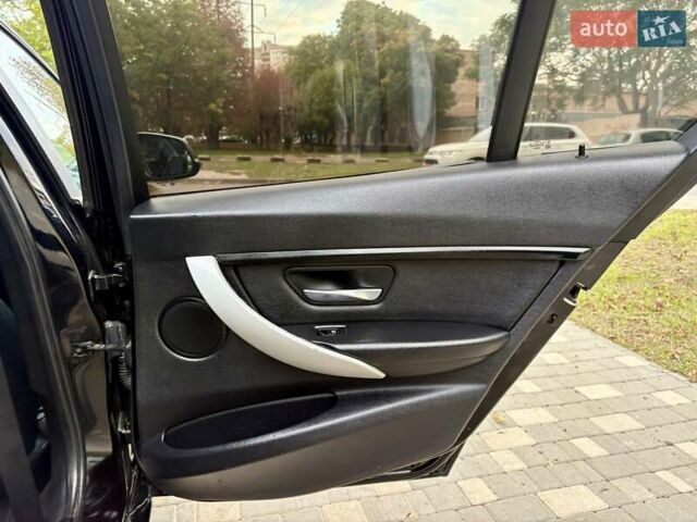 Черный БМВ 3 Серия, объемом двигателя 2 л и пробегом 177 тыс. км за 9400 $, фото 14 на Automoto.ua