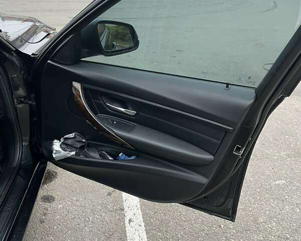 Чорний БМВ 3 Серія, об'ємом двигуна 2 л та пробігом 182 тис. км за 15300 $, фото 13 на Automoto.ua