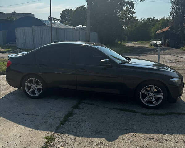 Чорний БМВ 3 Серія, об'ємом двигуна 2 л та пробігом 197 тис. км за 11800 $, фото 6 на Automoto.ua