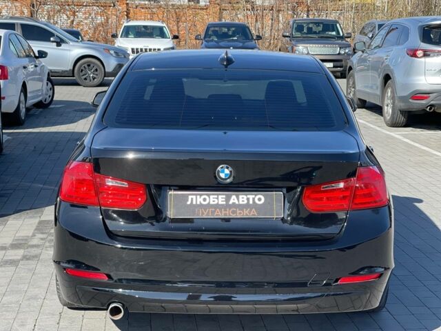 Чорний БМВ 3 Серія, об'ємом двигуна 2 л та пробігом 142 тис. км за 11900 $, фото 4 на Automoto.ua