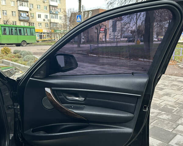 Чорний БМВ 3 Серія, об'ємом двигуна 2 л та пробігом 173 тис. км за 13450 $, фото 38 на Automoto.ua
