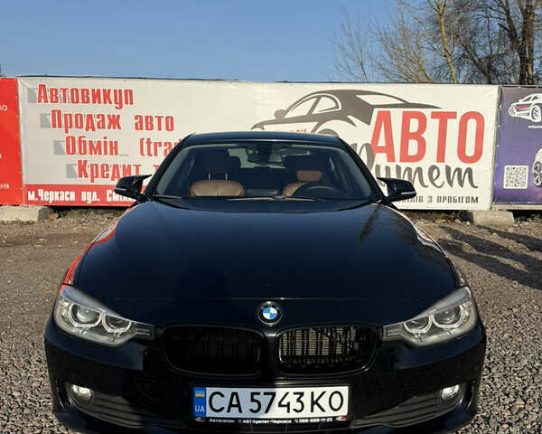 Черный БМВ 3 Серия, объемом двигателя 2 л и пробегом 231 тыс. км за 14700 $, фото 1 на Automoto.ua