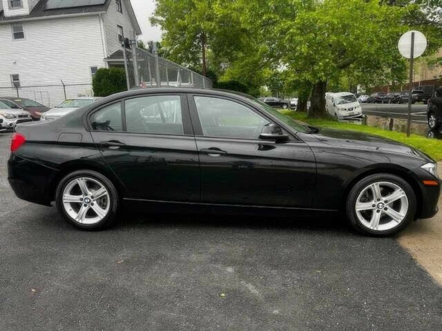 Черный БМВ 3 Серия, объемом двигателя 2 л и пробегом 77 тыс. км за 9900 $, фото 7 на Automoto.ua