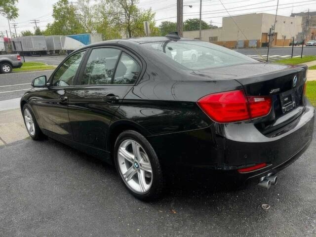 Черный БМВ 3 Серия, объемом двигателя 2 л и пробегом 77 тыс. км за 9900 $, фото 4 на Automoto.ua