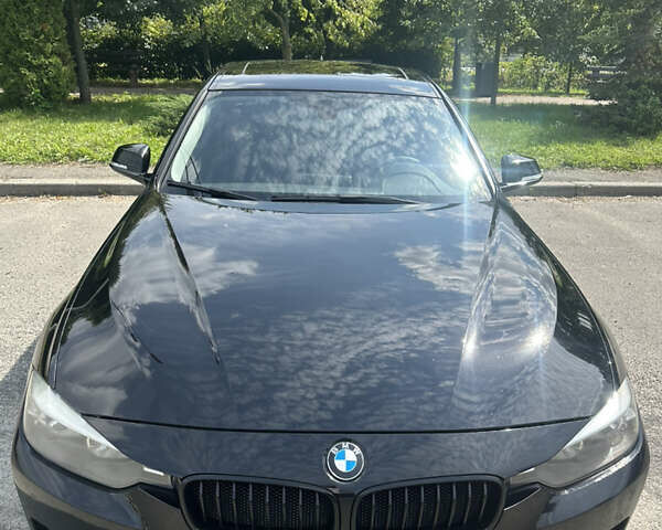 Черный БМВ 3 Серия, объемом двигателя 2 л и пробегом 202 тыс. км за 13000 $, фото 3 на Automoto.ua