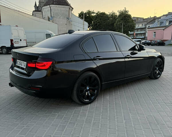 Черный БМВ 3 Серия, объемом двигателя 2 л и пробегом 129 тыс. км за 18000 $, фото 9 на Automoto.ua