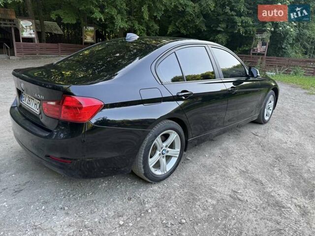 Черный БМВ 3 Серия, объемом двигателя 2 л и пробегом 175 тыс. км за 11600 $, фото 8 на Automoto.ua