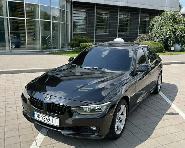 Чорний БМВ 3 Серія, об'ємом двигуна 2 л та пробігом 169 тис. км за 12500 $, фото 4 на Automoto.ua