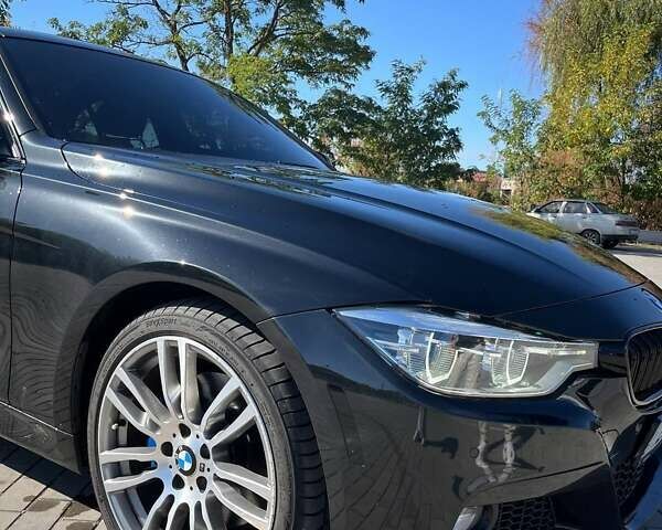 Чорний БМВ 3 Серія, об'ємом двигуна 2 л та пробігом 130 тис. км за 15400 $, фото 5 на Automoto.ua