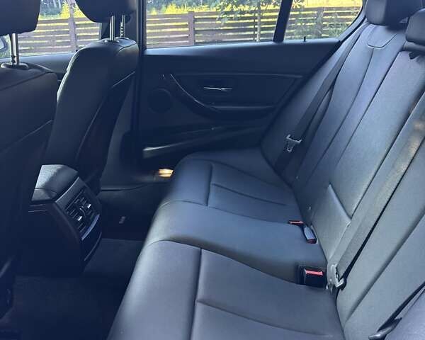 Черный БМВ 3 Серия, объемом двигателя 2 л и пробегом 175 тыс. км за 11200 $, фото 21 на Automoto.ua