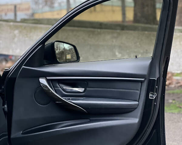 Черный БМВ 3 Серия, объемом двигателя 2 л и пробегом 231 тыс. км за 14499 $, фото 20 на Automoto.ua