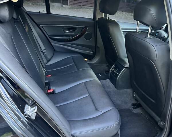 Черный БМВ 3 Серия, объемом двигателя 2 л и пробегом 175 тыс. км за 11200 $, фото 26 на Automoto.ua