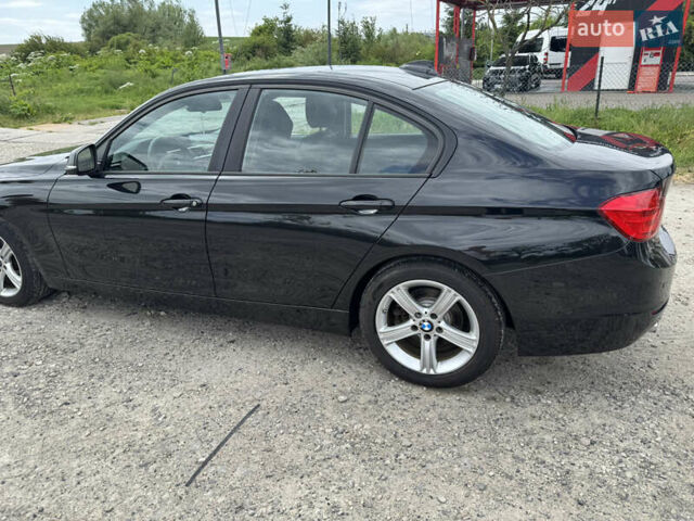Чорний БМВ 3 Серія, об'ємом двигуна 2 л та пробігом 185 тис. км за 13400 $, фото 5 на Automoto.ua