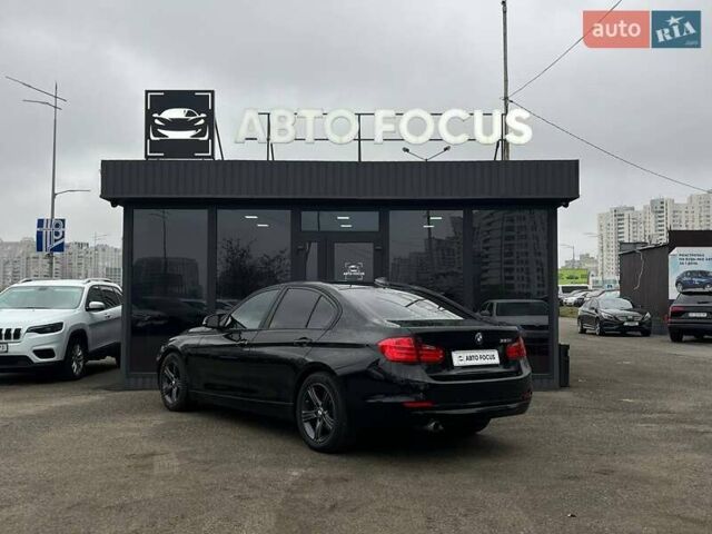 Чорний БМВ 3 Серія, об'ємом двигуна 2 л та пробігом 106 тис. км за 12490 $, фото 4 на Automoto.ua